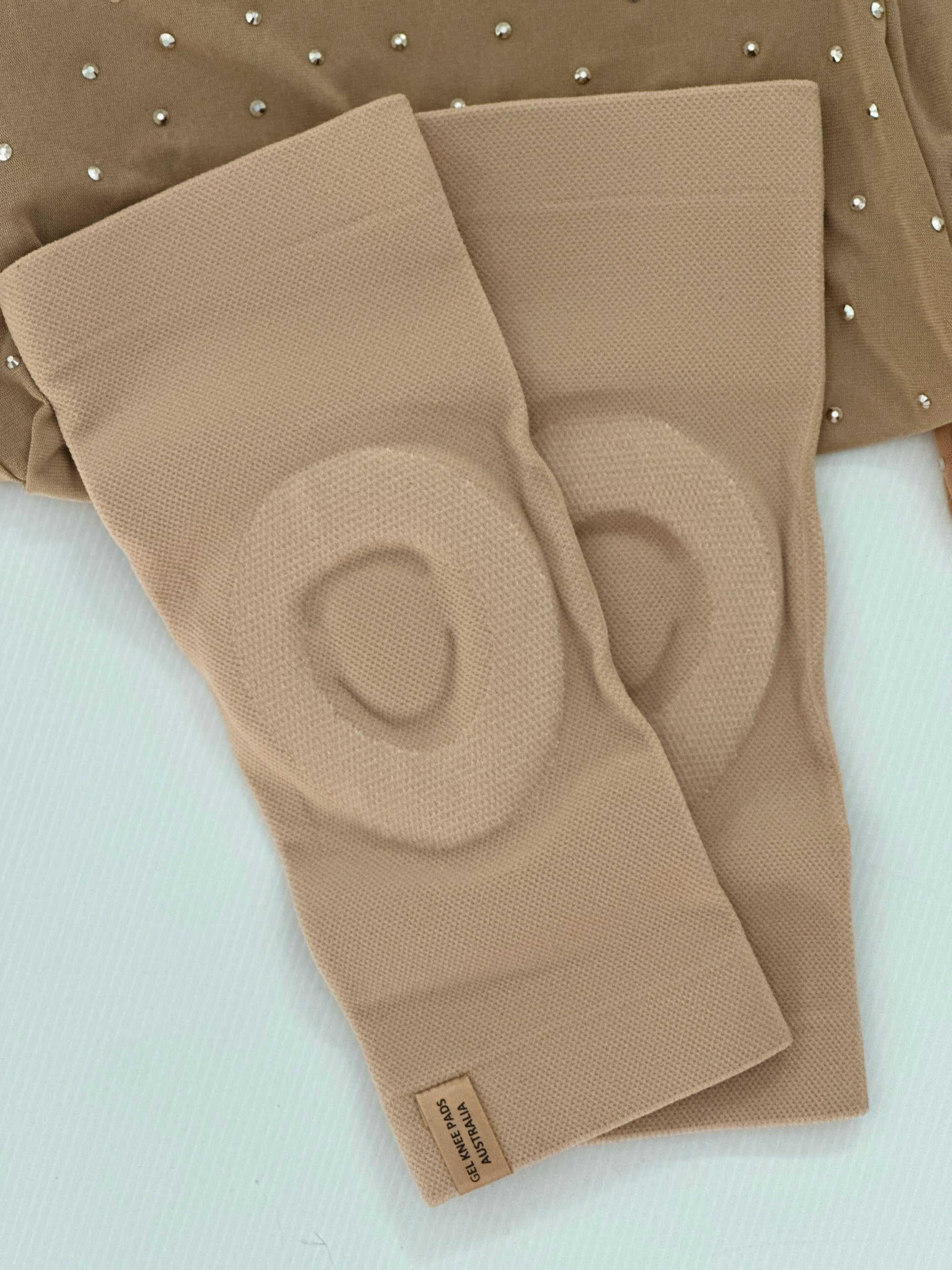 PolEssentials Sleeve Gel Knee Pads in Light Beige, with anti-slip support.